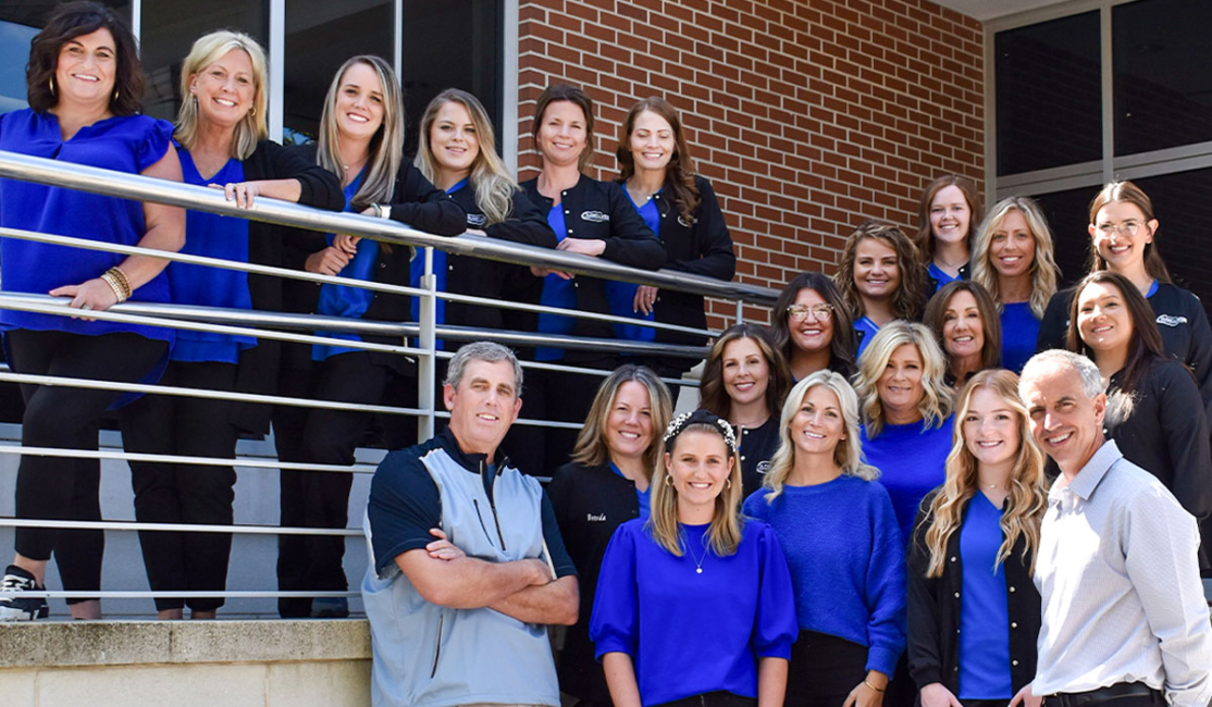 Image of Drs. Busby & Webb and Team outside of Busby & Webb Orthodontics